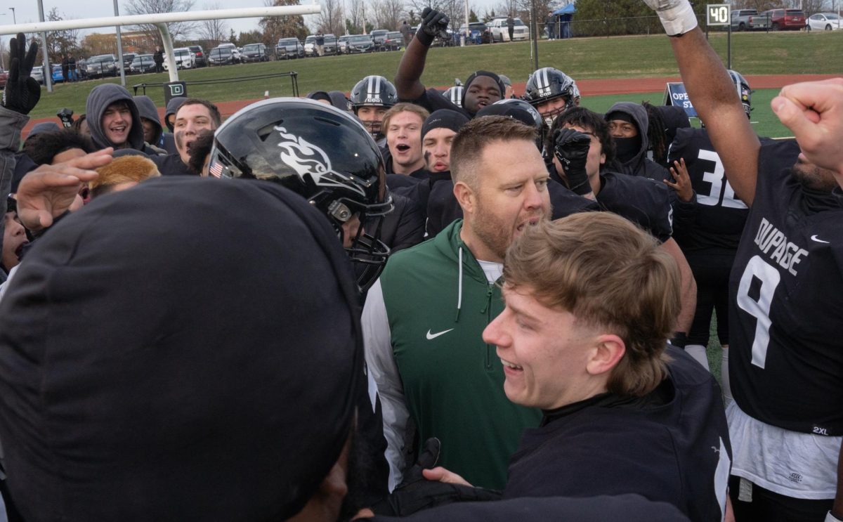 The COD football team celebrates after winning the national championship. 