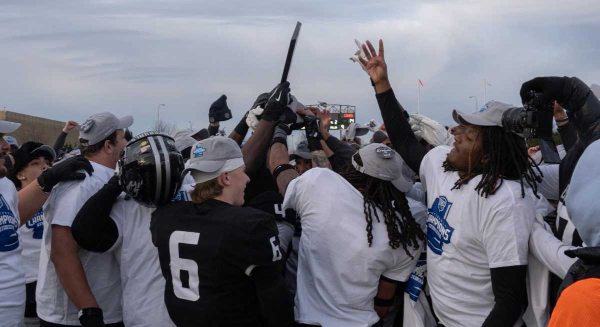 The COD football team celebrates after winning the national championship. 