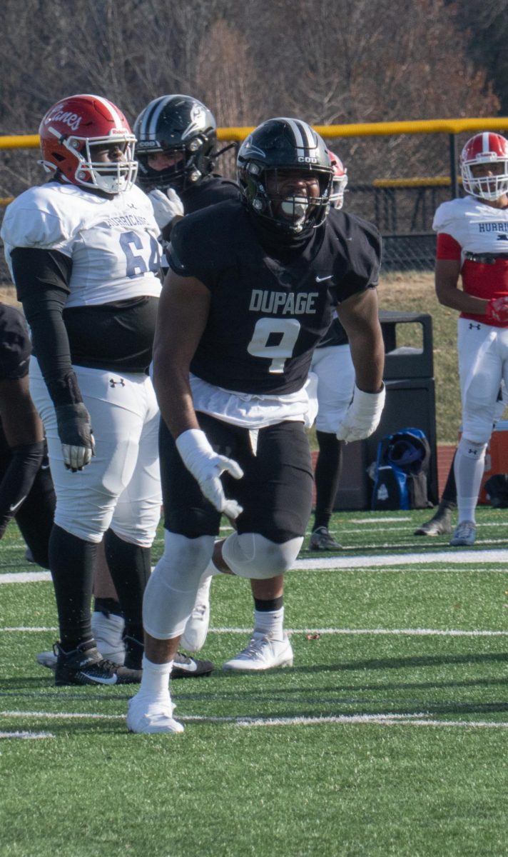 Defensive lineman Darion Johnson celebrates after making a tackle. 