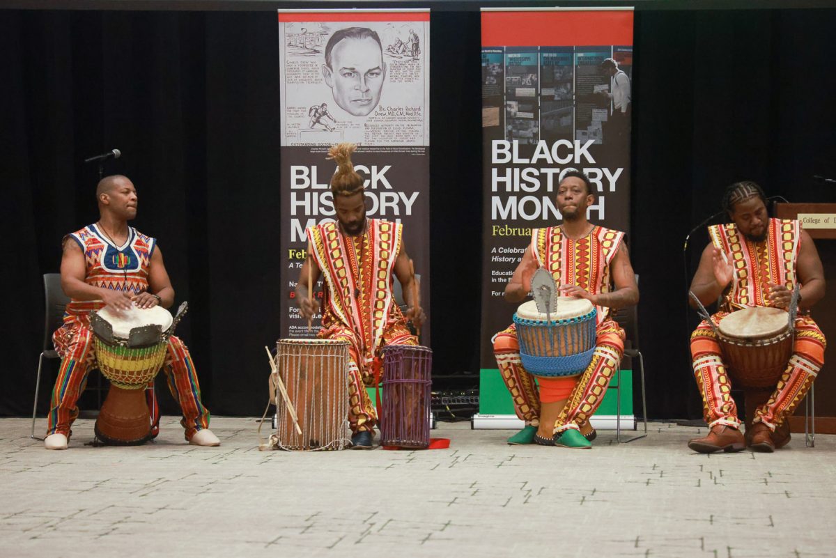 The Afrikan Dance and Music Institute and the Djembe Orchestra perform in the Black History Month opening ceremony. 