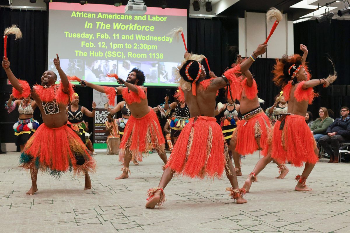 The Afrikan Dance and Music Institute performs in the Black History Month opening ceremony.