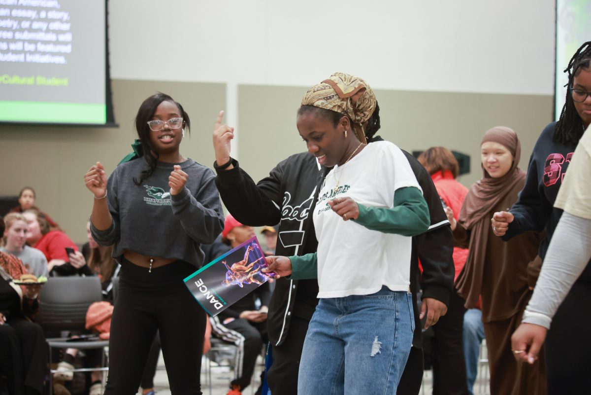 Students dance in the Black History Month opening ceremony.