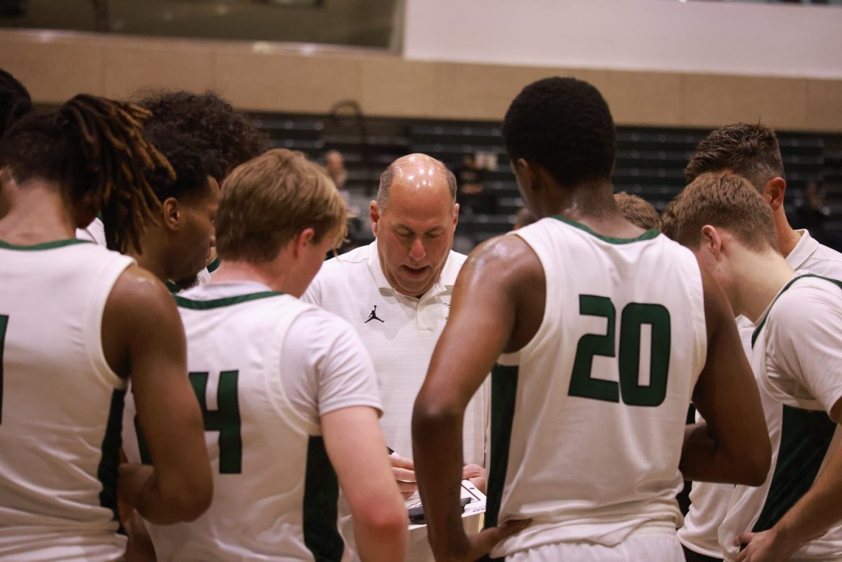 COD men's basketball head coach Joe Kuhn talks to the team. 