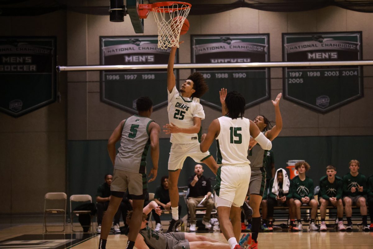 Sophomore forward Braylen Meredith scores a layup. 