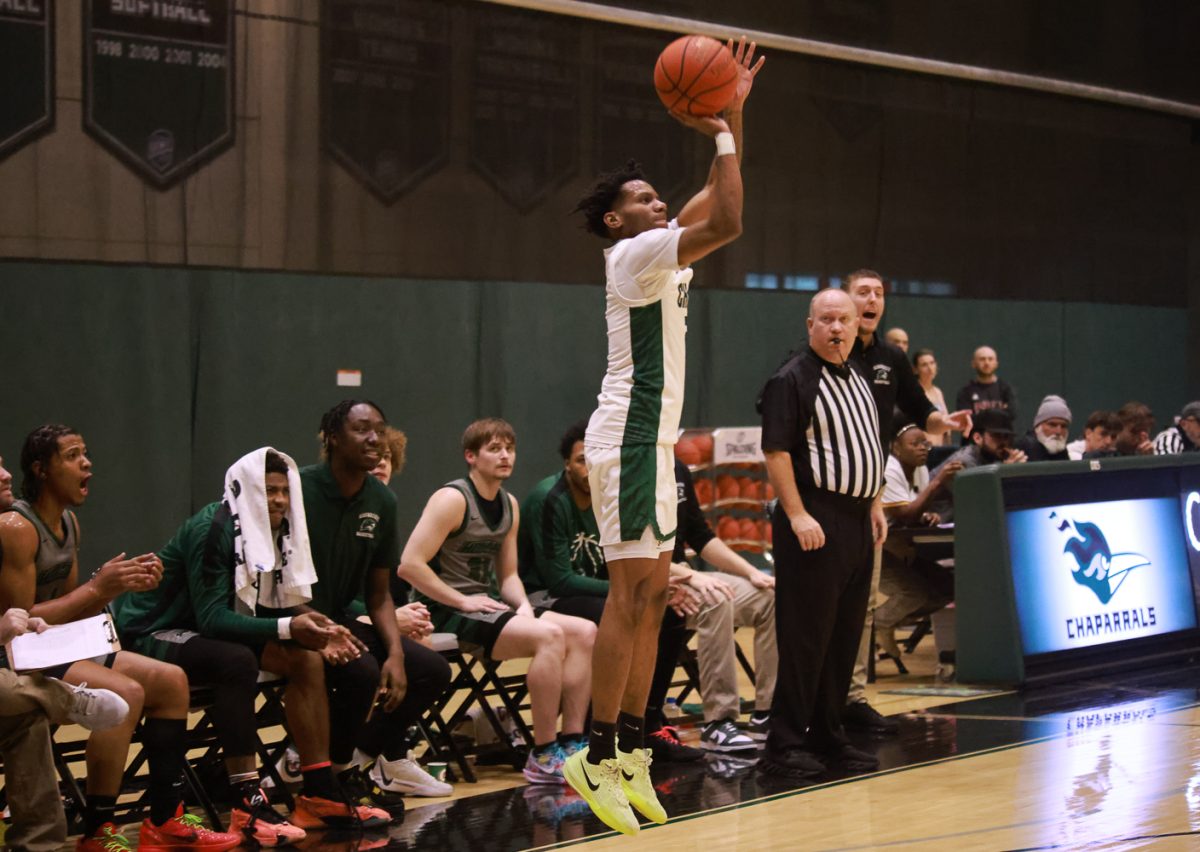 Sophomore guard Greg Strong shoots a three point shot. 