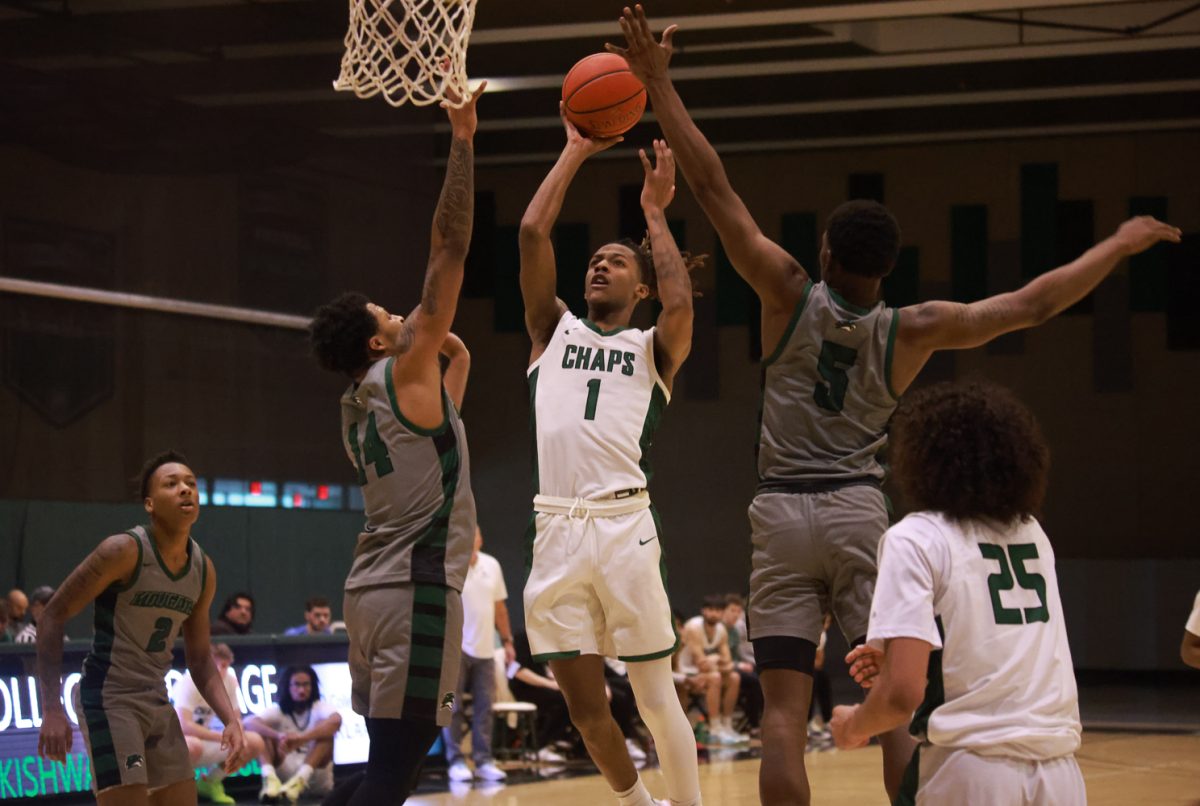 Freshman guard Charles Farrell makes a shot. 