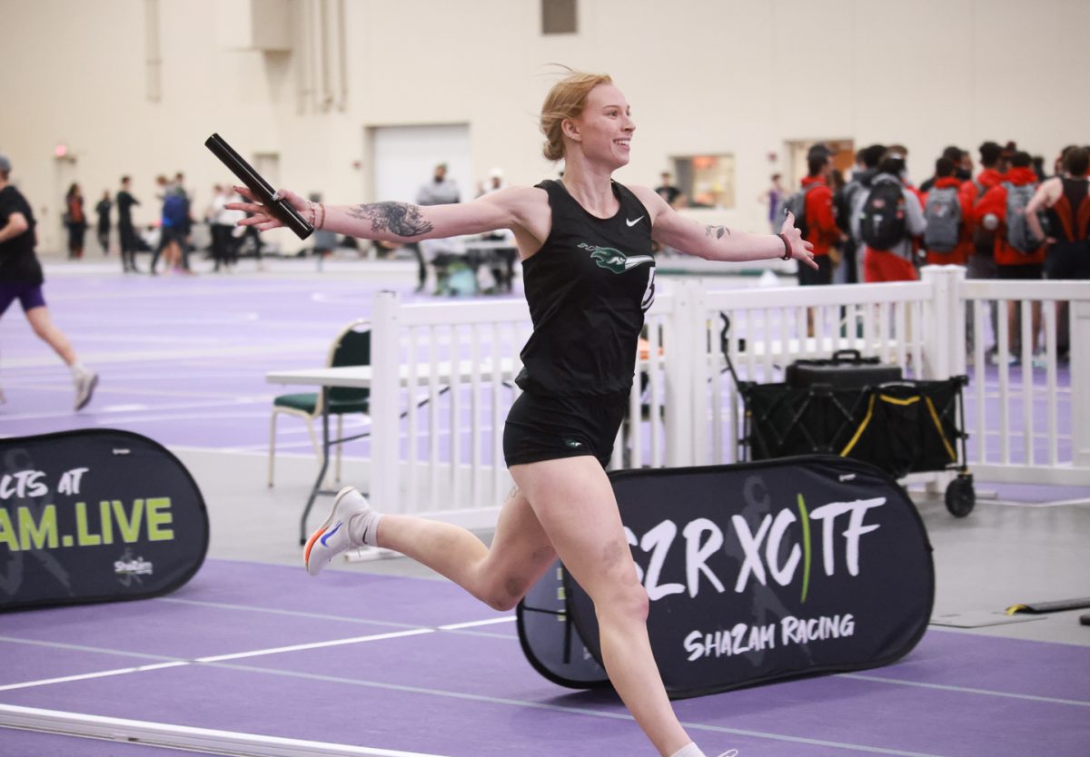 Ellie Logsdon crosses the finish line of the 4x400-meter relay. 