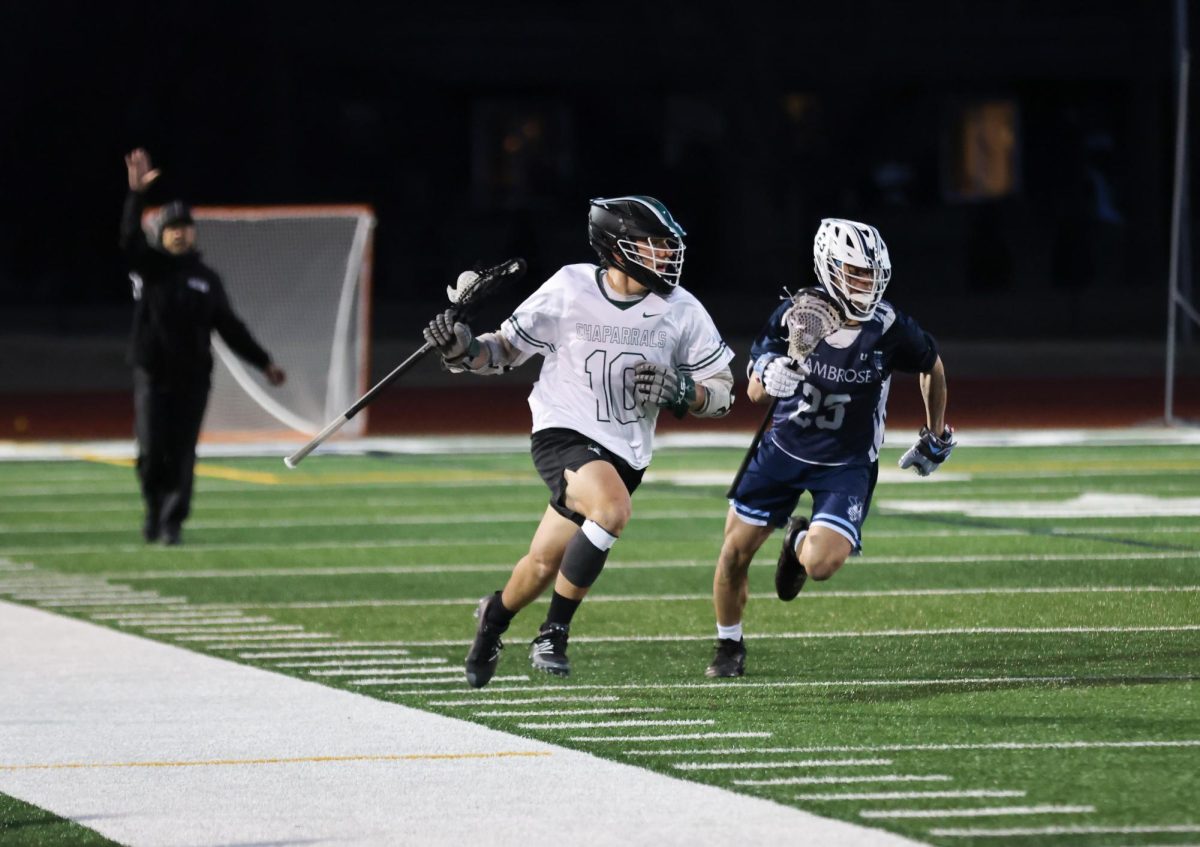 Freshman MJ Keblusek runs with the ball.