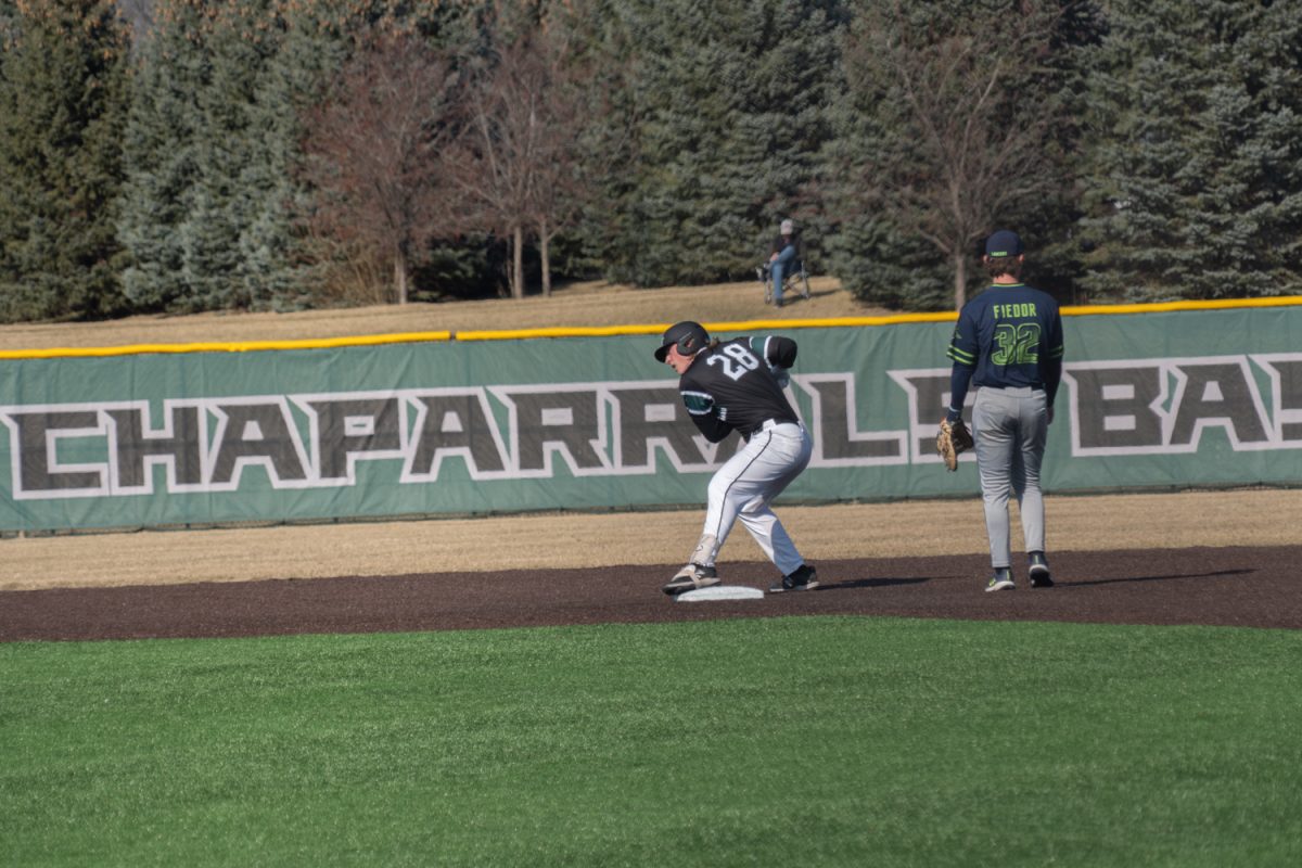 Number 28, Cullen Kleinsasser celebrating after hitting a double.

