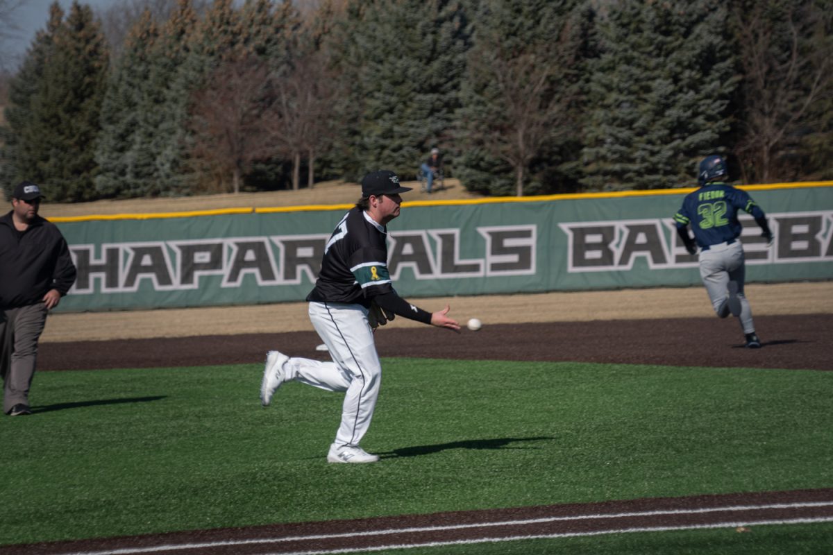 Number 37, Jayce Maranell tossing the ball to first for the out.
