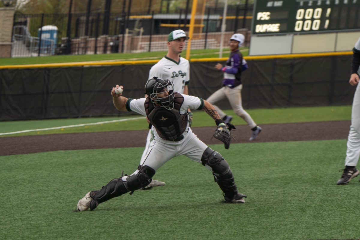 Number 6, Matthew Betancourt about to throw the ball to first.