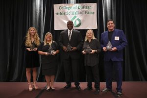 The hall of fame inductees pose for a portrait. (From left to right: Bethany Ester Atchinson, Kris Morton Holquist, George Hawthorne, Deb DiMatteo, and Gar Simers).