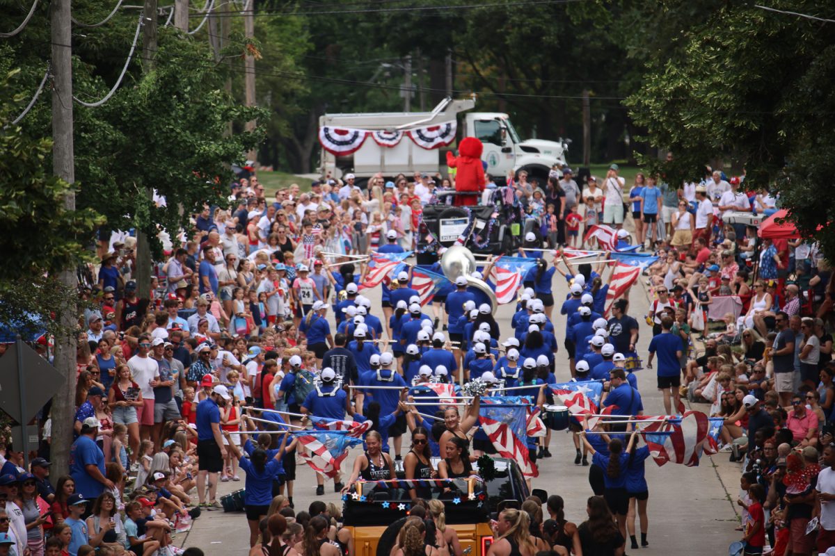 People march in the Fourth of July parade.