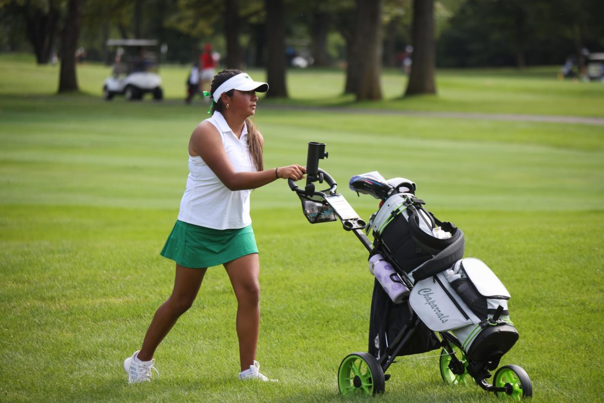 Liliana Martinez walks the course.
