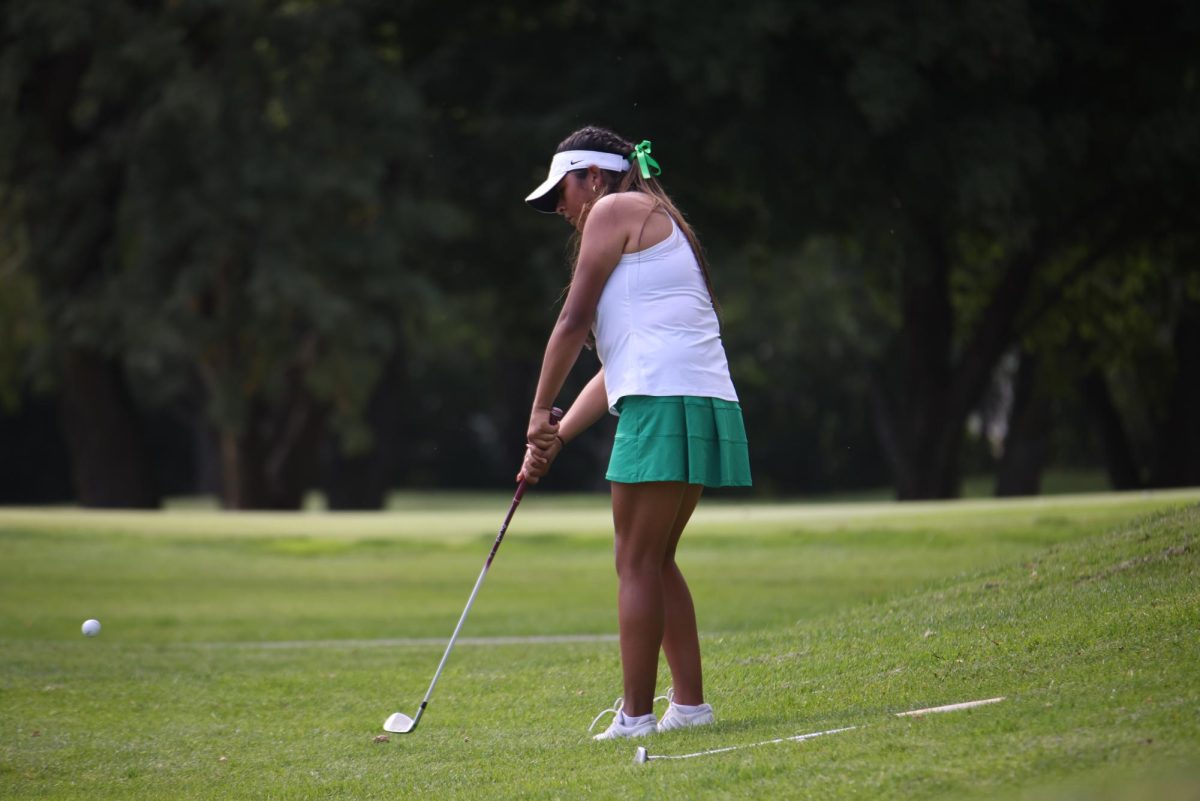 Liliana Martinez chips in the ball. 
