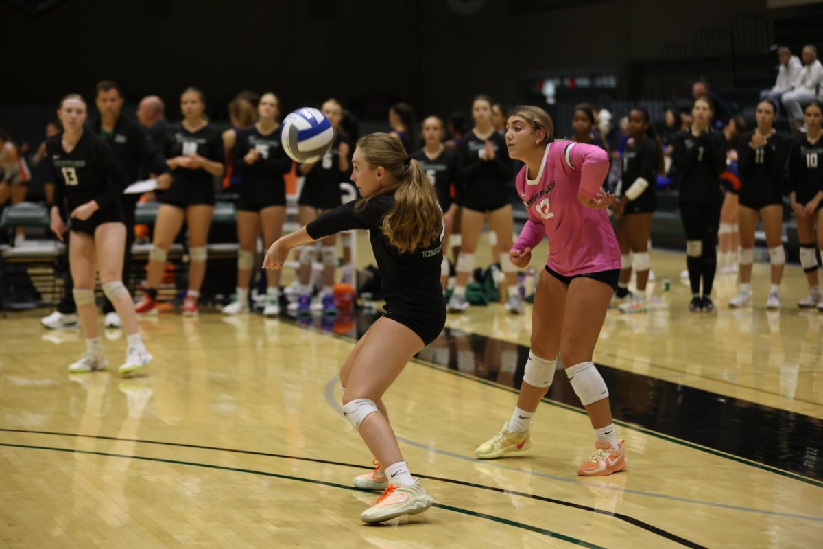 Freshman Jamie Loftus receives the ball. 