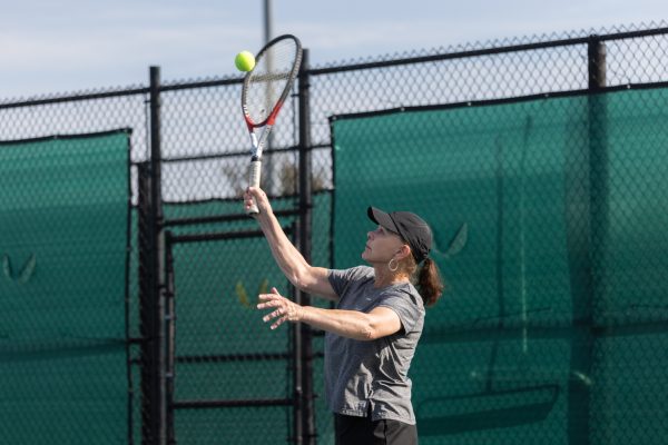 Kathy Johns serves.