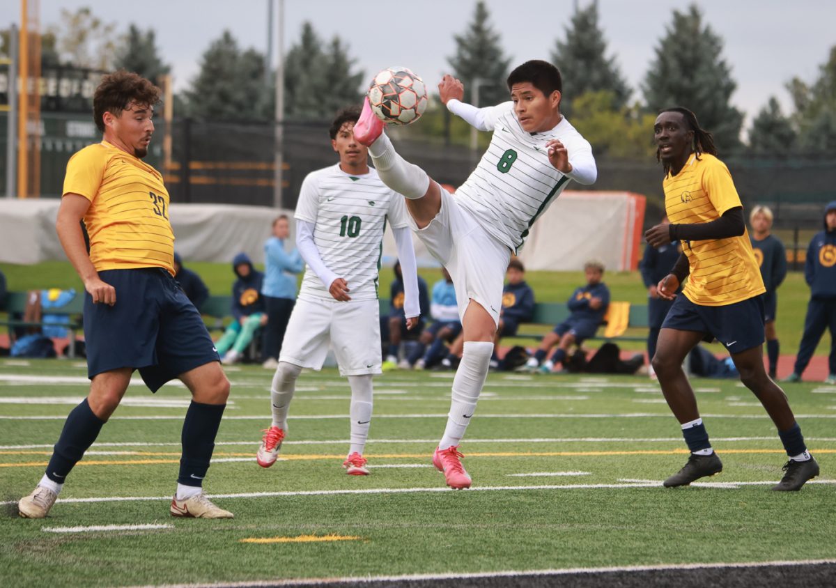 Erik Crisostomo attempts to score a goal. 