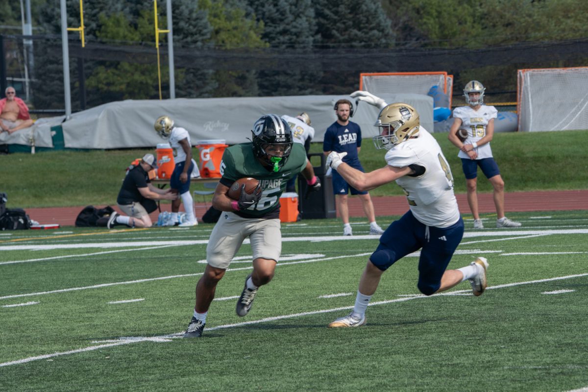 Number 16, Mark Melton running with the football.