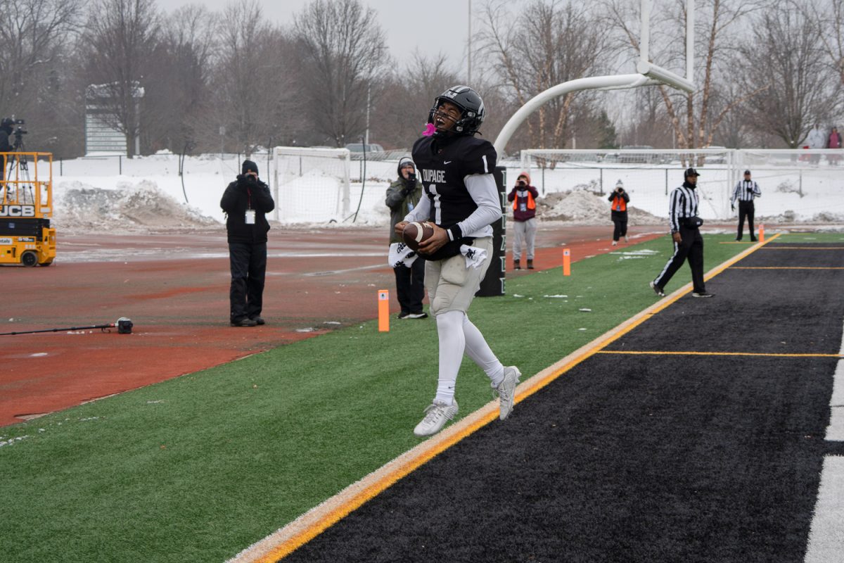 Justin Bland celebrates after scoring a touchdown. 