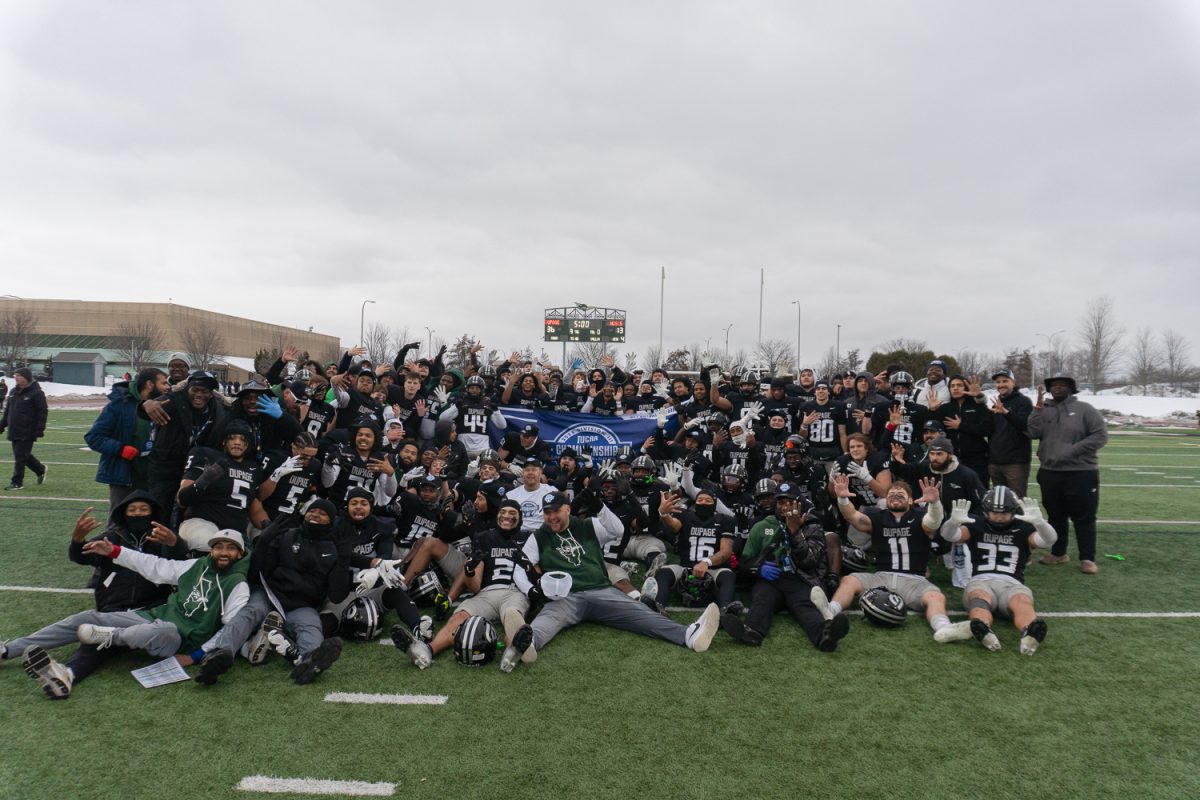 The College of DuPage football team celebrates after winning the national championship.