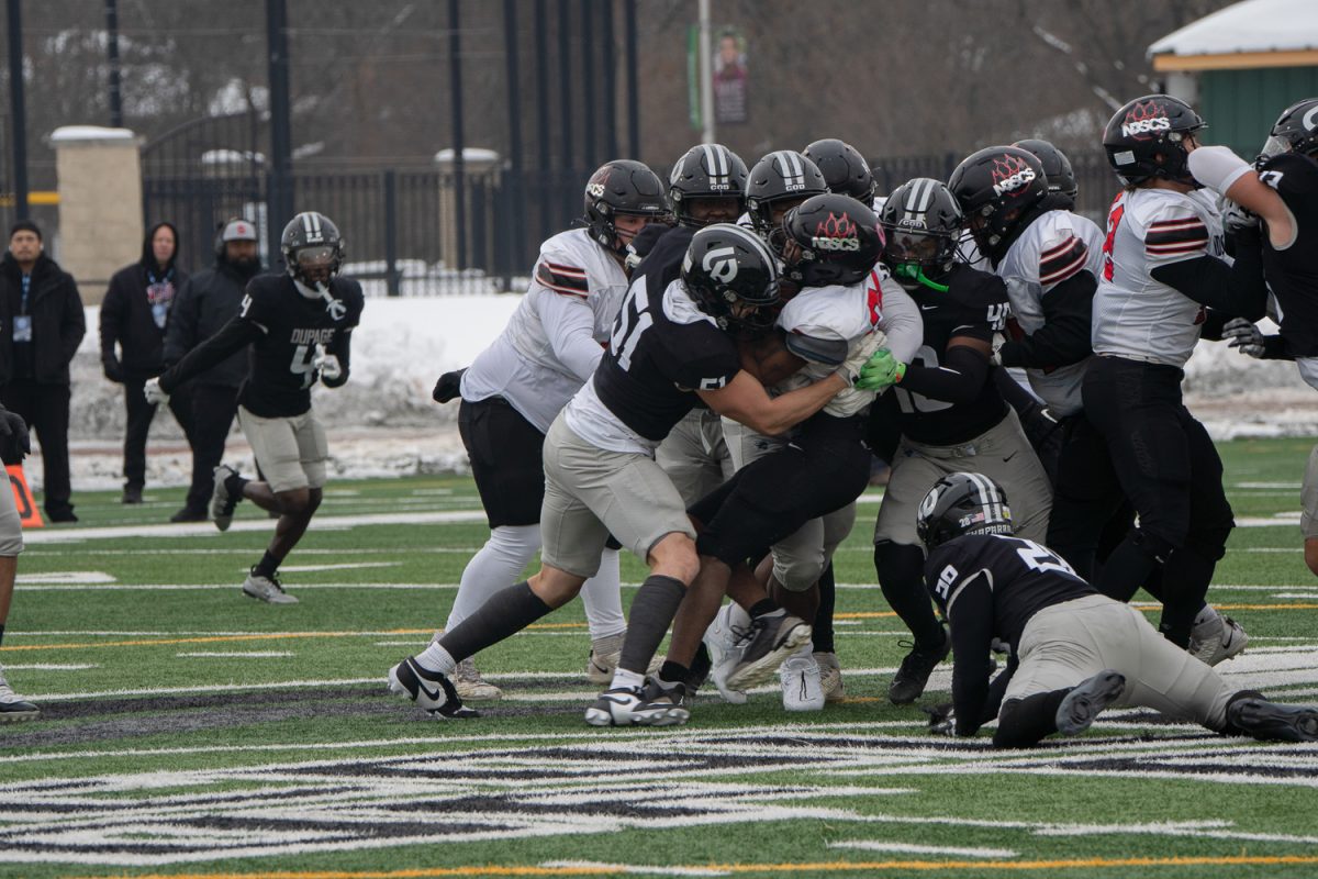 The COD defense makes a tackle.