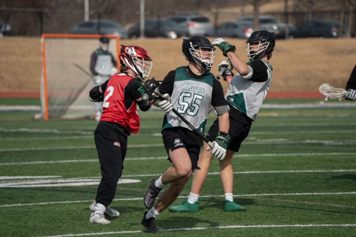 Number 55, Brady Menne running with the ball.