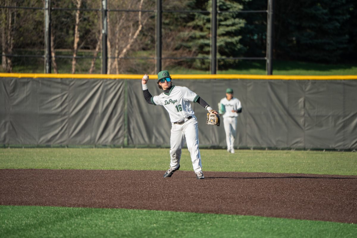 Number 16, Rocco Luciano about to make a throw to first.
