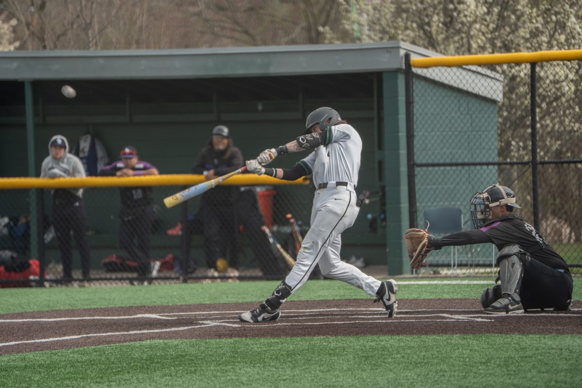 Number 4, Hudson Williams hitting a ball.

