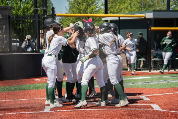 Players celebrating after the grand slam.
