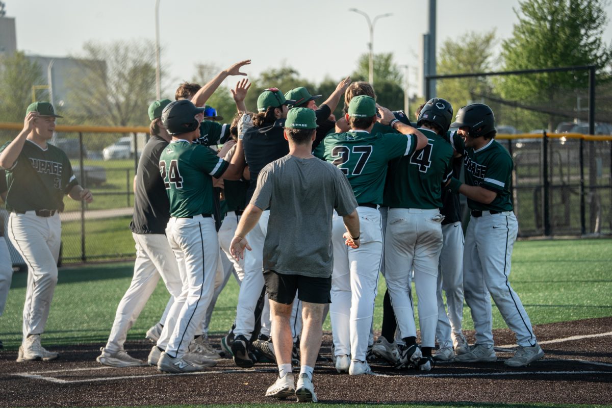 DuPage players celebrating winning the game. 
